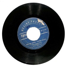 Güzide Kasacı - Aşk Bu Değil Yapma Güzel  Gözlerin Kömür Senin Bakışın Ömür Senin Plak (106.5)  PLK20003