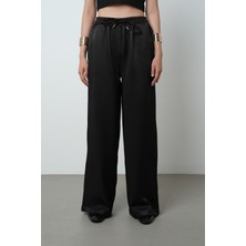 Orfeonegro Kadın Düz Renk Parlak Kumaş Bol Paça Beli Lastikli Pantolon