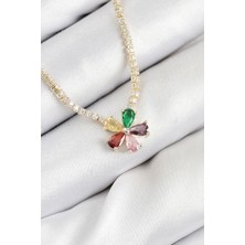 Claris Pirinç Zirkon Taşlı Su Yolu Asorti Çiçek Model Gold Renk Kadın Kolye