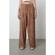 Orfeonegro Kadın Önü Taş Işlemeli Düz Renk Beli Lastikli Bol Paça Pantolon