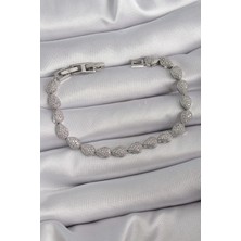 Claris Pirinç Gümüş Renk Zirkon Taşlı Damla Model VIP Seri Kadın Bileklik