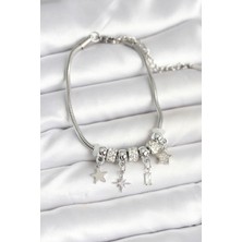 Clariss Pirinç Gümüş Renk Kutup Yıldızı Charmlı Kadın Bileklik