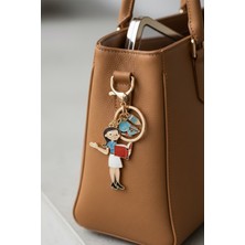 Modex Altın Sarısı Kitap Okuyan Öğretmen Çanta Aksesuarı Anahtarlık