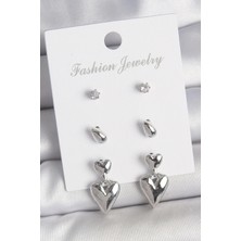 Claris Pirinç Gümüş Renk Zirkon Taşlı Sallantılı Kalp Model 3 Çift Kadın Küpe Seti