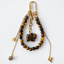 THEIA GemWorks Kleıo — Kaplan Gözü Çanta Aksesuarı