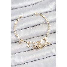Clariss Pirinç Zirkon Taşlı Istiridye ve Deniz Yıldızı Model Gold Renk Charm Bileklik - BLK-0084