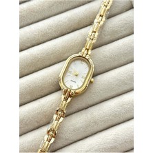 Coliseum Zarif Oval Kadran Altın Tonlu Kadın Saat – Vintage Seri