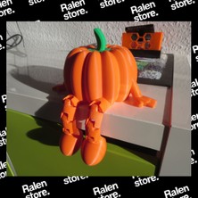 Ralen Oynar Eklemli Balkabağı Figürü – Oturan, Sallanan Bacaklı Dekoratif Biblo