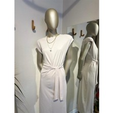 Elbise Uzun Yandan Kuşaklı