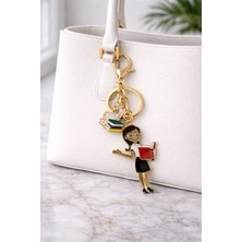 Modex Altın Sarısı Kitap Okuyan Öğretmen Çanta Aksesuarı Anahtarlık