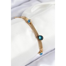 Ayder Timya 316L Çelik Nazar Boncuk Detaylı Mavi Zirkon Taşlı Model İtalyan Zincir Gold Renk Kadın Bileklik (Timya/1395) 193914