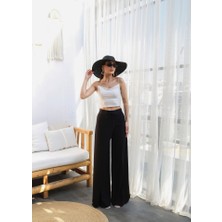 Keten Önü Çapraz Parçali Lasti̇kli̇ ve Bağcikli Geni̇ş Paça Pantolon