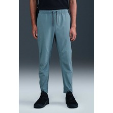 Nike Unlimited Men's Dri Fit Zip Cuff Versatile Trousers Erkek Dokuma Eşofman Altı Mavi