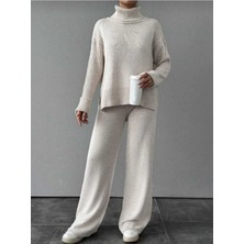 Newco Kadın Balıkçı Yaka Fitilli Saç Örgü Desenli Yanlardan Yırtmaçlı Alt Üst Triko Takım - Ekru