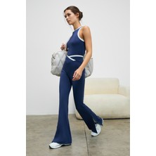 Urban Beat Glıpsen Kadın Yumuşak ve Esnek Dokulu Kontrast Biyeli Asimetrik Kemerli Ispanyol Paça Lacivert Tayt