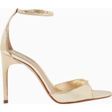 Schutz Scarlett 100 Altın Metalik Deri Bilekten Bağlamalı, 100MM Ince Topuklu Lüks Sandalet
