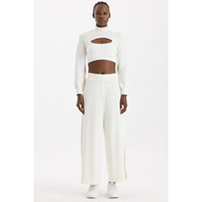 Dikişsiz Yırtmaçlı Pantolon Kırık Beyaz