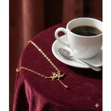 Generic Resena I Altın Renk Kuş Figürlü Çelik Kolye – Zarif Tasarım, Minimal ve Şık Model