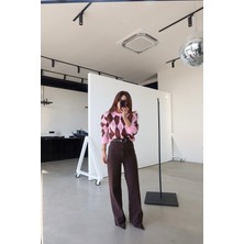 Özge Özgenç Paçası Kesik Deri Kemerli Jean