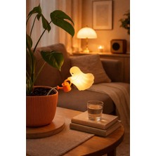 Modu3D Bitki Sulayan Hayalet Dekoru – Sıcak Işıklı Pilli Mumlu Saksı Lambası