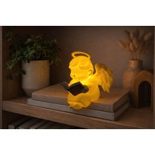 Modu3D Kitap Okuyan Melek Gece Lambası – Sıcak LED Işık | Dekoratif Masaüstü & Raf Lambası