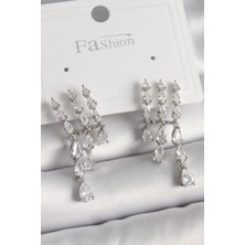 Clariss Pirinç Gümüş Renk Zirkon Taşlı Yağmur Model Kadın Küpe