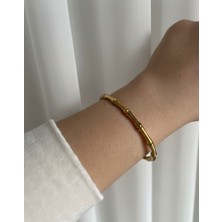 Winy Concept Gold Renk Özel Tasarım Kadın Çelik Kemik Kelepçe Bilezik - Kararmaz 316L Paslanmaz Çelik