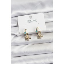 Clariss Mavi Taş Detaylı Pirinç Gold Renk Kadın Göçmen Küpesi