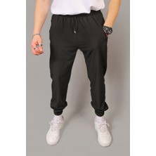 Influyente Eydamoon Erkek Siyah Baggy Tarz Paraşüt Kumaş Paça Lastikli Kompak Eşofman Altı