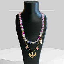 Shine Elagance Çelik Altın Rengi Zincir Ucunda Çelik Anka Kuşu ve Kalp Detaylı Kolye Kombini Pembe Cam Boncuk Araları Çiçek Detaylı Kapamaları Çelik Kadın Şık Kolye