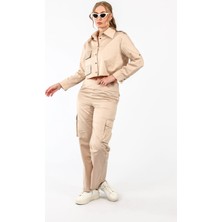 By Özlem Yazan Pamuk Saten Torba Cepli Bol Kesim Pantolon