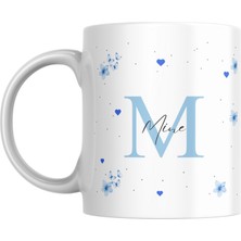 Mavi Çiçek ve Kalp Detaylarıyla Tasarlanmış, Kişiye Özel Isim ve Harfli Baskılı Kupa Bardak