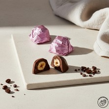 Nutat Pembe Sargılı Kristal Çikolata – Fındık Kremalı & Bütün Fındıklı 500 GR.