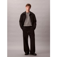 Calvin Klein Erkek Yüksek Lastikli Bel Geniş Paça Cep Detay Pamuklu Siyah Eşofman Altı LV04LD239G-UB1