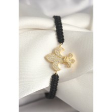 Eco Lounge Pirinç Gold Renk Zirkon Taşlı Zambak Figür Asansörlü Makrome Model Kadın Bileklik