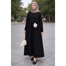 Moda Kadın Siyah Cepli Uzun Tesettür Elbise – Günlük Rahat Kesim, Kalp Detaylı, Mevsimlik Maxi Elbise