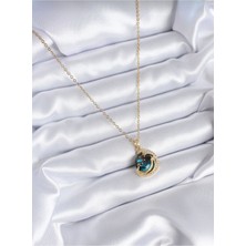 Normadia Şık Çelik Gezegen Kolye, Modern ve Zarif Takı Tasarımı