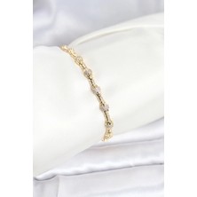Shoplet Buğz Pirinç Gold Renk Vıp Seri Punta Model Zirkon Taşlı Kadın Bileklik