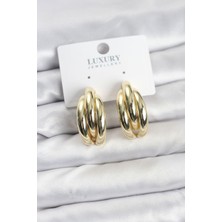 Clariss Gold Renk Pirinç Yarım Halka Model Kadın Küpe