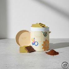 Nutat Çikolata Nutat 300 gr Sütlü Madlen Çikolata - Hoşgeldin Bebek Temalı Silindir Kutulu 🍫👶
