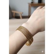 Elviore Store Kadın Gold Renk Parlak Şık Tırtıklı Ince Ajda- 3'lü Olarak Satılmaktadır