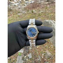 Nova Sales Lacivert Kadran Gold Çerçeveli Çelik Kadın Kol Saati – Taş Detaylı Şık Tasarım