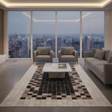 Decomarie Siyah ve Krem Tonlu Dana Derisi Patchwork Halı – El Yapımı Doğal Deri Dekoratif Halı