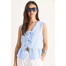 Tena Kadın Mavi Önü Bağlamalı Kolsuz Eteği Fırfırlı Muslin Bluz