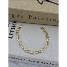 Hedef Bujiteri 14K Gold Renk Dalgalı Form Zirkon Taşlı Bileklik CM119