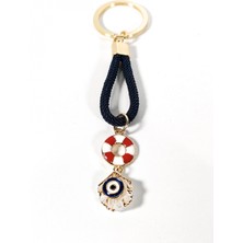 Moncuk Design Lacivert Örgü Ipli Can Simidi ve Nazar Figürlü Metal Anahtarlık – Deniz Temalı Şık ve Anlamlı Tasarım