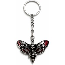 Herşey Nota Kırmızı Detaylı Kuru Kafa Figürlü Kanatlı Anahtarlık – Siyah Kaplama Metal