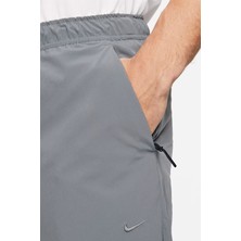 Nike Unlimited  Erkek Dri-Fıt Fermuarlı Paça Çok Amaçlı Pantolon