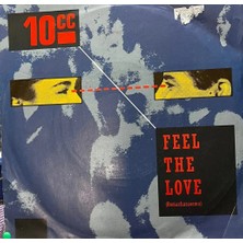 Plakantik 10CC - Feel The Love (Oomachasaooma) / She Gives Me Pain 7" Vinyl 1983 Mercury