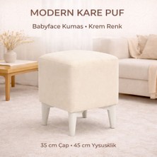 Armegeda Dekoratif Kare Puf 35X35X45 cm – Krem Babyface Kumaş, Beyaz Ahşap Ayaklı Modern Tasarım